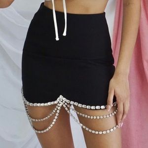 AREA rhinestone mini skirt
